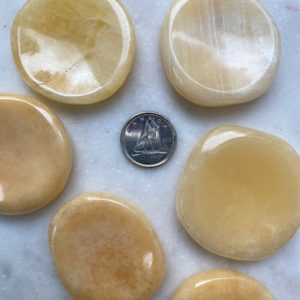 Orange Calcite Worry Stone | Natural genuine stones & crystals in various shapes & sizes. Buy raw cut, tumbled, or polished gemstones for making jewelry or crystal healing energy vibration raising reiki stones. #crystals #gemstones #crystalhealing #crystalsandgemstones #energyhealing #affiliate #ad