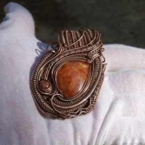 Shop Orange Calcite Jewelry! Orchid Calcite and Sunstone Copper Wire Wrapped Pendant | Natural genuine Orange Calcite jewelry. Buy crystal jewelry, handmade handcrafted artisan jewelry for women.  Unique handmade gift ideas. #jewelry #beadedjewelry #beadedjewelry #gift #shopping #handmadejewelry #fashion #style #product #jewelry #affiliate #ad