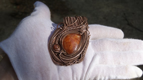 Orchid Calcite And Sunstone Copper Wire Wrapped Pendant