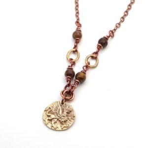 Shop Pietersite Necklaces! Bronze griffin necklace with brown pietersite beads, mythological creature, earth tones, mixed metals, 19 1/4 inches long | Natural genuine Pietersite necklaces. Buy crystal jewelry, handmade handcrafted artisan jewelry for women.  Unique handmade gift ideas. #jewelry #beadednecklaces #beadedjewelry #gift #shopping #handmadejewelry #fashion #style #product #necklaces #affiliate #ad