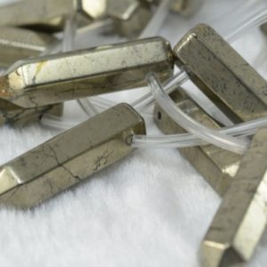 faceted ppoint pyrite beads – bronze natural pyrite gemstone – pyrite pendant beads supplies – wholesale pendant beads -32x8mm beads-12beads | Natural genuine beads Gemstone beads for beading and jewelry making.  #jewelry #beads #beadedjewelry #diyjewelry #jewelrymaking #beadstore #beading #affiliate #ad