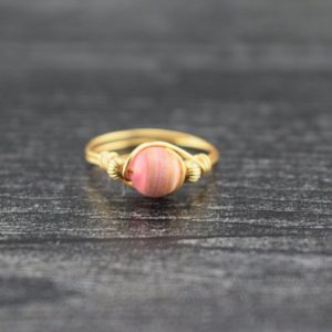 Shop Rhodochrosite Rings! 14 K Gold Filled Rhodochrosite Bead Ring | Natural genuine Rhodochrosite rings, simple unique handcrafted gemstone rings. #rings #jewelry #shopping #gift #handmade #fashion #style #affiliate #ad