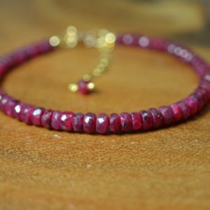 Raw Red Ruby Bracelet in 14k Gold // July Birthstone // 15th, 40th Anniversary // Genuine Ruby // Stacking Bracelet // Gemstone Bracelet | Natural genuine Array jewelry. Buy crystal jewelry, handmade handcrafted artisan jewelry for women.  Unique handmade gift ideas. #jewelry #beadedjewelry #beadedjewelry #gift #shopping #handmadejewelry #fashion #style #product #jewelry #affiliate #ad