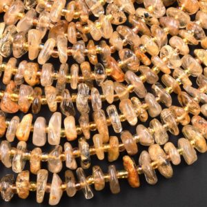 Shop Rutilated Quartz Rondelle Beads! Natural Golden Rutilated Quartz Large Freeform Rondelle Beads 15.5" Strand | Natural genuine rondelle Rutilated Quartz beads for beading and jewelry making.  #jewelry #beads #beadedjewelry #diyjewelry #jewelrymaking #beadstore #beading #affiliate #ad