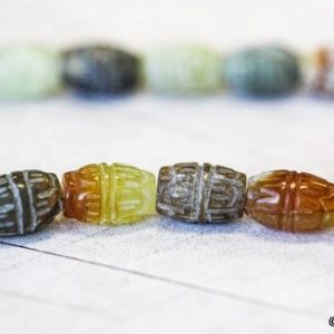 M/ Soocho Jade 10x15mm Carved Oval Beads 16" Strand Enhanced Serpentine Carved Oriental Ancient Barrel Beads For Crafts For Jewelry Making | Natural genuine beads Gemstone beads for beading and jewelry making.  #jewelry #beads #beadedjewelry #diyjewelry #jewelrymaking #beadstore #beading #affiliate #ad