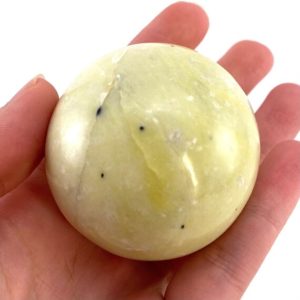 Shop Serpentine Stones & Crystals! Serpentine Sphere, yellow serpentine sphere, crystal ball, crystal sphere, serpentine | Natural genuine stones & crystals in various shapes & sizes. Buy raw cut, tumbled, or polished gemstones for making jewelry or crystal healing energy vibration raising reiki stones. #crystals #gemstones #crystalhealing #crystalsandgemstones #energyhealing #affiliate #ad