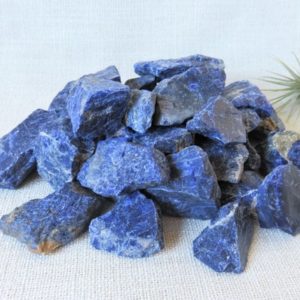 Shop Raw & Rough Sodalite Stones! Sodalite raw stones, nature | Natural genuine stones & crystals in various shapes & sizes. Buy raw cut, tumbled, or polished gemstones for making jewelry or crystal healing energy vibration raising reiki stones. #crystals #gemstones #crystalhealing #crystalsandgemstones #energyhealing #affiliate #ad