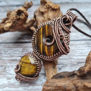 Shop Tiger Eye Pendants! Twin Tigers Eye Pendant, Wire Wrapped Pendant, Gemini Birthstone, Protection Pendant, Good Luck Stone, Golden Tigers Eye, Gemstone Doughnut | Natural genuine Tiger Eye pendants. Buy crystal jewelry, handmade handcrafted artisan jewelry for women.  Unique handmade gift ideas. #jewelry #beadedpendants #beadedjewelry #gift #shopping #handmadejewelry #fashion #style #product #pendants #affiliate #ad