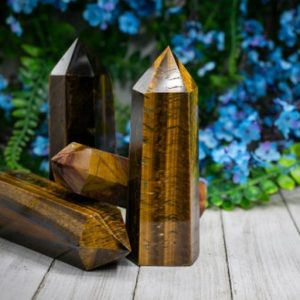 Shop Tiger Eye Points & Wands! Large Tigers Eye Crystal Tower Point | Natural genuine stones & crystals in various shapes & sizes. Buy raw cut, tumbled, or polished gemstones for making jewelry or crystal healing energy vibration raising reiki stones. #crystals #gemstones #crystalhealing #crystalsandgemstones #energyhealing #affiliate #ad