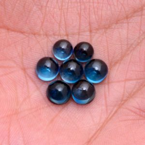 Shop Topaz Round Beads! AAA+ London Blue Topaz 6mm-10mm Loose Round Flat Back Smooth Cabochon | Genuine Fine London Blue Topaz Precious Gemstone Loose Cabs Lot | Natural genuine round Topaz beads for beading and jewelry making.  #jewelry #beads #beadedjewelry #diyjewelry #jewelrymaking #beadstore #beading #affiliate #ad