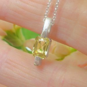 Shop Yellow Sapphire Pendants! Unheated Yellow Sapphire Pendant 1.08ct Emerald Cut Unheated Yellow Sapphire Bar Necklace. Sterling Silver. Chain included, choice of length | Natural genuine Yellow Sapphire pendants. Buy crystal jewelry, handmade handcrafted artisan jewelry for women.  Unique handmade gift ideas. #jewelry #beadedpendants #beadedjewelry #gift #shopping #handmadejewelry #fashion #style #product #pendants #affiliate #ad