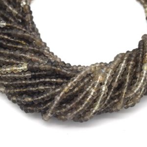Shop Smoky Quartz Rondelle Beads! 5mm Faceted Natural Mixed Light Gray Smoky Quartz Rondelle Shaped Beads – 13.5" Strand (App 100 Beads) High Quality Hand-Cut Indian Gemstone | Natural genuine rondelle Smoky Quartz beads for beading and jewelry making.  #jewelry #beads #beadedjewelry #diyjewelry #jewelrymaking #beadstore #beading #affiliate #ad