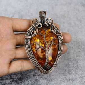 Shop Amber Pendants! Tree Of Life Beautiful Baltic Amber Pendant Copper Wire Wrapped Pendant Oxidized Copper Baltic Amber Pendants For Women Baltic Stone Pendant | Natural genuine Amber pendants. Buy crystal jewelry, handmade handcrafted artisan jewelry for women.  Unique handmade gift ideas. #jewelry #beadedpendants #beadedjewelry #gift #shopping #handmadejewelry #fashion #style #product #pendants #affiliate #ad