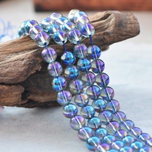 Natural Glossy Blue Angel Aura Quartz Gemstone Round Beads | Grade A | Sold by 15 Inch Strand | Size 6mm 8mm 10mm | Natural genuine round Angel Aura Quartz beads for beading and jewelry making.  #jewelry #beads #beadedjewelry #diyjewelry #jewelrymaking #beadstore #beading #affiliate #ad