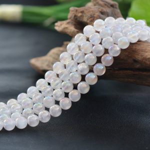 Shop Angel Aura Quartz Beads! Natural White Glossy Angel Aura Quartz Gemstone Round Beads | Grade A | Sold by 15 Inch Strand | Size 6mm 8mm 10mm | Natural genuine round Angel Aura Quartz beads for beading and jewelry making.  #jewelry #beads #beadedjewelry #diyjewelry #jewelrymaking #beadstore #beading #affiliate #ad