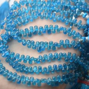 Shop Apatite Bead Shapes! 8 Inches Strand,Natural Neon Blue Apatite Smooth Tear Drops Shaped Briolette 6-4mm | Natural genuine other-shape Apatite beads for beading and jewelry making.  #jewelry #beads #beadedjewelry #diyjewelry #jewelrymaking #beadstore #beading #affiliate #ad