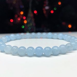 Shop Aquamarine Bracelets! Blue aquamarine 6 mm beaded bracelet for men, woman, courage and protection bracelet | Natural genuine Aquamarine bracelets. Buy handcrafted artisan men's jewelry, gifts for men.  Unique handmade mens fashion accessories. #jewelry #beadedbracelets #beadedjewelry #shopping #gift #handmadejewelry #bracelets #affiliate #ad