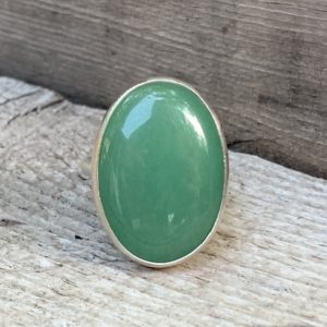 Elegant Large Oval Emerald Green Aventurine Statement Ring in Sterling Silver | Green Gemstone Ring | Silver Ring | Statement Ring | Natural genuine Gemstone jewelry. Buy crystal jewelry, handmade handcrafted artisan jewelry for women.  Unique handmade gift ideas. #jewelry #beadedjewelry #beadedjewelry #gift #shopping #handmadejewelry #fashion #style #product #jewelry #affiliate #ad
