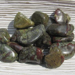 Shop Tumbled Bloodstone Crystals & Pocket Stones! Dragon's Blood Stone, Dragon's Blood Jasper, Dragon's Blood Crystal, Dragon's Blood Gemstone, Dragon Stone, Healing Crystals and Stones | Natural genuine stones & crystals in various shapes & sizes. Buy raw cut, tumbled, or polished gemstones for making jewelry or crystal healing energy vibration raising reiki stones. #crystals #gemstones #crystalhealing #crystalsandgemstones #energyhealing #affiliate #ad