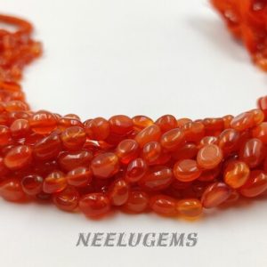 Shop Carnelian Chip & Nugget Beads! Natural Orange Carnelian Smooth Nugget Shape Gemstone Beads,Carnelian Smooth Nuggets,Carnelian Pebble Nuggets,Carnelian Tiny Nuggets,SALE | Natural genuine chip Carnelian beads for beading and jewelry making.  #jewelry #beads #beadedjewelry #diyjewelry #jewelrymaking #beadstore #beading #affiliate #ad