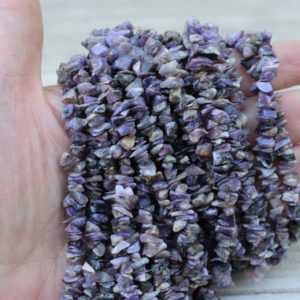 Shop Charoite Beads! Charoite Chips / Beads – Natural Gemstone Chips – 34-35" Long Strand | Natural genuine beads Charoite beads for beading and jewelry making.  #jewelry #beads #beadedjewelry #diyjewelry #jewelrymaking #beadstore #beading #affiliate #ad