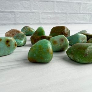 Shop Tumbled Chrysoprase Crystals & Pocket Stones! Chrysoprase tumbled crystals | healing crystals for connection, forgiveness, and compassion | Natural genuine stones & crystals in various shapes & sizes. Buy raw cut, tumbled, or polished gemstones for making jewelry or crystal healing energy vibration raising reiki stones. #crystals #gemstones #crystalhealing #crystalsandgemstones #energyhealing #affiliate #ad