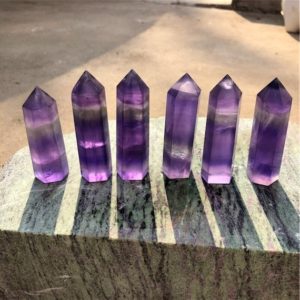Shop Fluorite Stones & Crystals! Fluorite Tower Purple Fluorite Obelisk Crystal Point Tower Double Terminated Crystal Wand Healing Crystal Bulk Wholesale | Natural genuine stones & crystals in various shapes & sizes. Buy raw cut, tumbled, or polished gemstones for making jewelry or crystal healing energy vibration raising reiki stones. #crystals #gemstones #crystalhealing #crystalsandgemstones #energyhealing #affiliate #ad