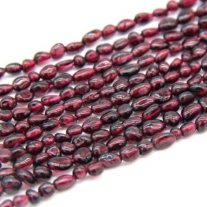 Shop Garnet Chip & Nugget Beads! Red Garnet Nugget Beads 3-6MM Grade AA Tiny Garnet Pebble Beads Natural Red Gemstone Chips Tumble Beads Irregular Shape Nugget | Natural genuine chip Garnet beads for beading and jewelry making.  #jewelry #beads #beadedjewelry #diyjewelry #jewelrymaking #beadstore #beading #affiliate #ad