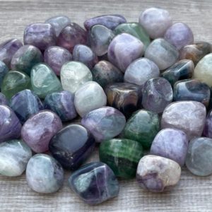 Shop Tumbled Fluorite Crystals & Pocket Stones! Grade A+ Fluorite Tumbled Stones, 0.75-1.25 Inch Tumbled Rainbow Fluorite Stones, Fluorite Crystals, Healing Crystals, Pick a Weight | Natural genuine stones & crystals in various shapes & sizes. Buy raw cut, tumbled, or polished gemstones for making jewelry or crystal healing energy vibration raising reiki stones. #crystals #gemstones #crystalhealing #crystalsandgemstones #energyhealing #affiliate #ad