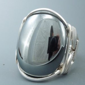 Shop Hematite Jewelry! Handcrafted Sterling Silver Large Hematite Cabochon Wire Wrapped Ring | Natural genuine Hematite jewelry. Buy crystal jewelry, handmade handcrafted artisan jewelry for women.  Unique handmade gift ideas. #jewelry #beadedjewelry #beadedjewelry #gift #shopping #handmadejewelry #fashion #style #product #jewelry #affiliate #ad