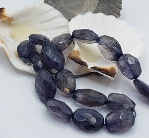 Shop Iolite Chip & Nugget Beads! Natural Iolite Faceted Nugget Oval Beads 88.5cts. 8 In. Strand,  Iolite Nugget Beads,Water Sapphire, Blue Iolite | Natural genuine chip Iolite beads for beading and jewelry making.  #jewelry #beads #beadedjewelry #diyjewelry #jewelrymaking #beadstore #beading #affiliate #ad