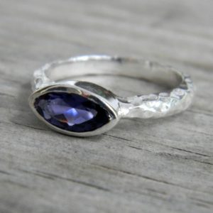 Shop Iolite Rings! Bezel set Iolite Ring, Blue Iolite Marquise Ring, Handcrafted Sapphire Blue Ring,  Hammered Silver Gemstone Ring with Low Profile | Natural genuine Iolite rings, simple unique handcrafted gemstone rings. #rings #jewelry #shopping #gift #handmade #fashion #style #affiliate #ad