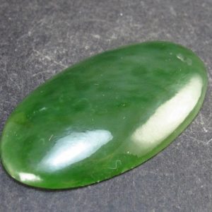Shop Jade Cabochons! Nephrite Jade Cabochon From Canada – 1.8" – 9.6 Grams | Natural genuine stones & crystals in various shapes & sizes. Buy raw cut, tumbled, or polished gemstones for making jewelry or crystal healing energy vibration raising reiki stones. #crystals #gemstones #crystalhealing #crystalsandgemstones #energyhealing #affiliate #ad