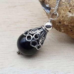 Small Black Jet pendant. Reiki jewelry uk. Bali silver Wire wrapped pendant. 12mm stone. Minimalist cone necklace | Natural genuine Jet pendants. Buy crystal jewelry, handmade handcrafted artisan jewelry for women.  Unique handmade gift ideas. #jewelry #beadedpendants #beadedjewelry #gift #shopping #handmadejewelry #fashion #style #product #pendants #affiliate #ad