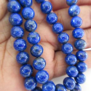Shop Lapis Lazuli Round Beads! Lapis Lazuli Round Beads, Blue Lapis Lazuli Beads, Natural AAA Lapis Lazuli Beads, 5mm/7mm/9mm Lapis Beads, 16 Inch Strand, GDS1287 | Natural genuine round Lapis Lazuli beads for beading and jewelry making.  #jewelry #beads #beadedjewelry #diyjewelry #jewelrymaking #beadstore #beading #affiliate #ad