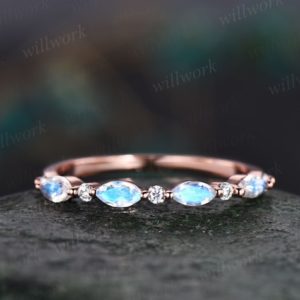 Marquise cut moonstone wedding band 14k rose gold art deco moonstone ring moissanite wedding band stacking ring band bridal ring for women | Natural genuine Gemstone rings, simple unique alternative gemstone engagement rings. #rings #jewelry #bridal #wedding #jewelryaccessories #engagementrings #weddingideas #affiliate #ad