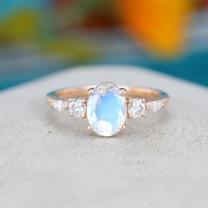 Oval cut Moonstone engagement ring rose gold Unique engagement ring vintage Simple marquise moissanite wedding Bridal Promise gift for women | Natural genuine Array jewelry. Buy handcrafted artisan wedding jewelry.  Unique handmade bridal jewelry gift ideas. #jewelry #beadedjewelry #gift #crystaljewelry #shopping #handmadejewelry #wedding #bridal #jewelry #affiliate #ad