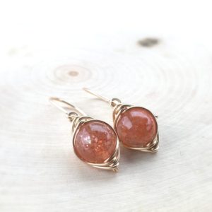 Natural Sunstone Earrings, Sunstone Dangle Earrings, 14k Gold Filled, Orange Gemstones, Gemstone Jewelry | Natural genuine Sunstone earrings. Buy crystal jewelry, handmade handcrafted artisan jewelry for women.  Unique handmade gift ideas. #jewelry #beadedearrings #beadedjewelry #gift #shopping #handmadejewelry #fashion #style #product #earrings #affiliate #ad