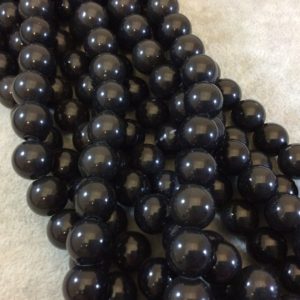 Shop Obsidian Beads! 12mm Black Obsidian Round/Ball Large Hole Beads – 8" Strand (Approx. 17 Beads) – Natural Semi-Precious Gemstone – Great for Leather and Hemp | Natural genuine beads Obsidian beads for beading and jewelry making.  #jewelry #beads #beadedjewelry #diyjewelry #jewelrymaking #beadstore #beading #affiliate #ad
