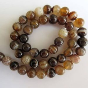 Shop Onyx Round Beads! Banded Onyx Large Hole Gemstone beads, 8mm Banded Onyx Smooth Round Beads, Drill Size 1mm, 15 Inch Strand, GDS560 | Natural genuine round Onyx beads for beading and jewelry making.  #jewelry #beads #beadedjewelry #diyjewelry #jewelrymaking #beadstore #beading #affiliate #ad
