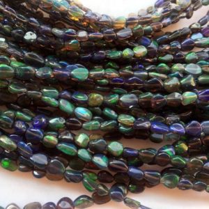 Shop Opal Chip & Nugget Beads! Black Ethiopian Welo Opal Smooth Tumble Beads, Ethiopian Opal Beads, Welo Opal Nugget Beads, 3mm To 7mm Approx, 18 Inches Strand, GDS1049/7 | Natural genuine chip Opal beads for beading and jewelry making.  #jewelry #beads #beadedjewelry #diyjewelry #jewelrymaking #beadstore #beading #affiliate #ad
