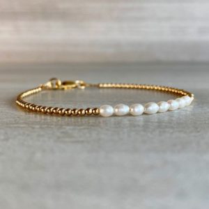 Shop Pearl Bracelets! Real Pearl Bracelet | Dainty Pearl Jewelry | Sterling Silver or Gold Clasp | Custom Size for Large or Small Wrists | Tiny Bead Bracelet | Natural genuine Pearl bracelets. Buy crystal jewelry, handmade handcrafted artisan jewelry for women.  Unique handmade gift ideas. #jewelry #beadedbracelets #beadedjewelry #gift #shopping #handmadejewelry #fashion #style #product #bracelets #affiliate #ad