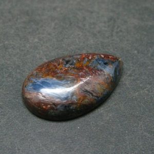 Shop Pietersite Stones & Crystals! Pietersite Cabochon Stone From Namibia – 0.9" | Natural genuine stones & crystals in various shapes & sizes. Buy raw cut, tumbled, or polished gemstones for making jewelry or crystal healing energy vibration raising reiki stones. #crystals #gemstones #crystalhealing #crystalsandgemstones #energyhealing #affiliate #ad