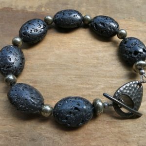 Shop Pyrite Bracelets! Black Lava Rock Bracelet, chunky unisex basalt lava stone and iron pyrite bead tribal Bohemian jewelry for men or women | Natural genuine Pyrite bracelets. Buy handcrafted artisan men's jewelry, gifts for men.  Unique handmade mens fashion accessories. #jewelry #beadedbracelets #beadedjewelry #shopping #gift #handmadejewelry #bracelets #affiliate #ad