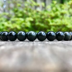 Shop Rainbow Obsidian Bracelets! Rainbow Obsidian Bracelet Multicolor 8mm Grade AAA Rainbow Obsidian Beaded Gemstone Bracelet Black Obsidian Bracelet Jewelry Gift Bracelet | Natural genuine Rainbow Obsidian bracelets. Buy crystal jewelry, handmade handcrafted artisan jewelry for women.  Unique handmade gift ideas. #jewelry #beadedbracelets #beadedjewelry #gift #shopping #handmadejewelry #fashion #style #product #bracelets #affiliate #ad