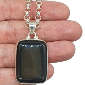 Shop Rainbow Obsidian Pendants! Rainbow Obsidian Pendant, Sterling Silver, Rectangle Shaped, Volcanic Gemstone, Activates Root Chakra, Heals a broken Heart, Offers Support | Natural genuine Rainbow Obsidian pendants. Buy crystal jewelry, handmade handcrafted artisan jewelry for women.  Unique handmade gift ideas. #jewelry #beadedpendants #beadedjewelry #gift #shopping #handmadejewelry #fashion #style #product #pendants #affiliate #ad