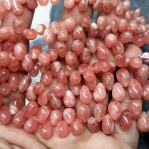 Shop Rhodochrosite Bead Shapes! 7 Inches Strand, Natural Rhodochrosite Smooth Pear Shape Briolettes,Size. 8-10mm | Natural genuine other-shape Rhodochrosite beads for beading and jewelry making.  #jewelry #beads #beadedjewelry #diyjewelry #jewelrymaking #beadstore #beading #affiliate #ad
