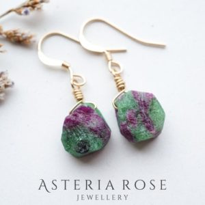 Ruby Zoisite Earrings • July Birthstone Earrings • Raw Crystal Jewelry • Rough Stone Earrings • Cancer Zodiac • 40th Anniversary Gifts | Natural genuine Gemstone earrings. Buy crystal jewelry, handmade handcrafted artisan jewelry for women.  Unique handmade gift ideas. #jewelry #beadedearrings #beadedjewelry #gift #shopping #handmadejewelry #fashion #style #product #earrings #affiliate #ad