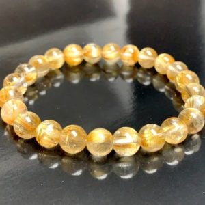 Shop Rutilated Quartz Bracelets! AAAAA Golden Rutilated Quartz Bracelet Spiritual Guidance Clarity Manifestation Psychic Ability gifts for dad boyfriend husband grandpa men | Natural genuine Rutilated Quartz bracelets. Buy crystal jewelry, handmade handcrafted artisan jewelry for women.  Unique handmade gift ideas. #jewelry #beadedbracelets #beadedjewelry #gift #shopping #handmadejewelry #fashion #style #product #bracelets #affiliate #ad