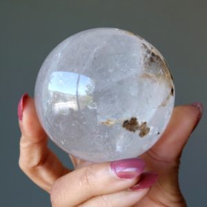 Shop Smoky Quartz Shapes! Smoky Quartz Sphere Mystery Mineral Inclusion Gray Crystal Ball | Natural genuine stones & crystals in various shapes & sizes. Buy raw cut, tumbled, or polished gemstones for making jewelry or crystal healing energy vibration raising reiki stones. #crystals #gemstones #crystalhealing #crystalsandgemstones #energyhealing #affiliate #ad